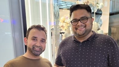 Faiz Patel and Allen Pinto take the chance to catch up during the three-day public holiday.