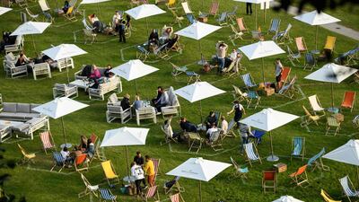 Festival-goers experience the Gisburne Park Pop-Up, the first purpose-built outdoor festival in the UK factoring in social-distancing rules, while in their designated pitches on the Gisburne Park Estate in the village of Gisburn, near Clitheroe, northern England. AFP