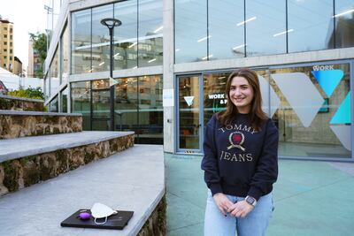 Lyne Mneimneh, a co-founder of The Lawyard, stands outside the co-working space in Beirut from which she works.