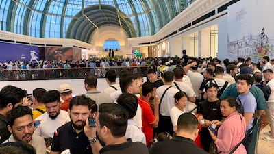 People queue for the iPhone 15 at Mall of the Emirates in Dubai. Pawan Singh / The National