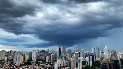 Using Tokyo as an example, researchers say collecting rainwater to spray on rooftops during hot weather could reduce air conditioning use. Adobe