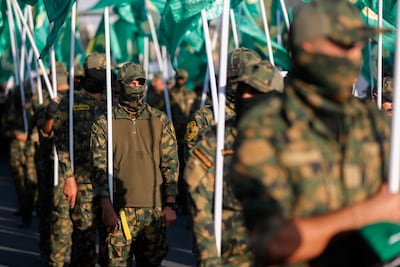 Members of the Popular Mobilisation Forces. Iraq’s Prime Minister Mohammed Shia Al Sudani has political alliances with figures tied to the PMF. AFP