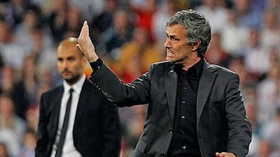 Real Mardrid coach Jose Mourinho, right, was sent to the stands for protesting Pepe's red card.