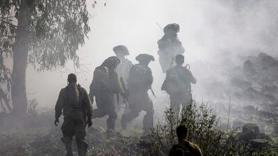 Israeli soldiers exercise in the annexed Golan Heights in December 2023. AFP