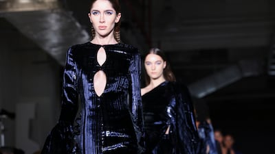 Models present creations by Christian Siriano. Reuters