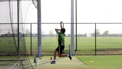 Christopher Woolley bowls as cricket training returns at Its Just Cricket academy in Jebel Ali. Chris Whiteoak / The National