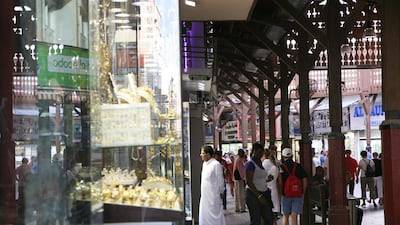 Gold coins won at the Your Weight for Gold competition in Dubai were spotted at the the gold souq in Deira as some winners cash in on their prizes. Amy Leang/The National