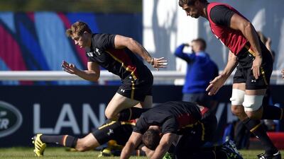Wales wing Hallam Amos runs during a training session on Friday ahead of their Rugby World Cup match against England on Saturday. Franck Fife / AFP