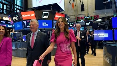British actress Elizabeth Hurley, global ambassador of S&P 500-listed Estée Lauder Companies' breast cancer campaign, visits the New York Stock Exchange on Wednesday October 2. AFP
