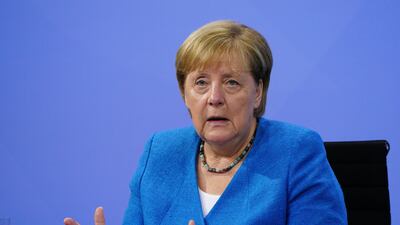 German Chancellor Angela Merkel speaks after a virtual meeting with state premiers about the current coronavirus situation at the Chancellery in Berlin. EPA