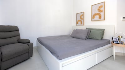 The master bedroom of the 78.2 square metre home, which also has a small balcony