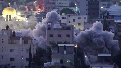 Families in the residential building were given only hours to gather some belongings and leave. AFP