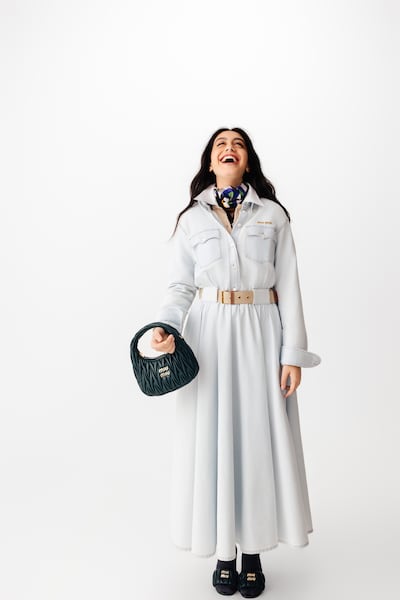 Chambray midi-dress; cashmere crew-neck shirt; printed silk scarf; silk socks; matelassé nappa leather mules; and matelassé Wander bag, all from Miu Miu