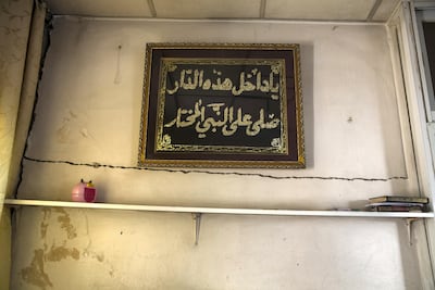 A damaged wall inside the home of Nisreen Awada in Wadi Hilweh in Silwan, a contested neighbourhood right beyond the Old City's walls in Jerusalem. Heidi Levine for The National.