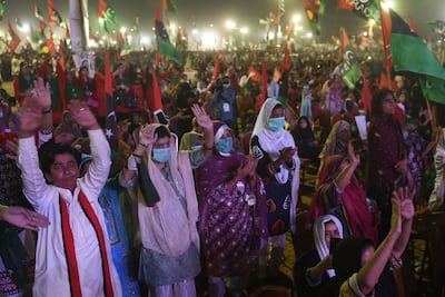 Supporters of Pakistan Democratic Movement, an alliance of political opposition parties, attend a rally in Karachi on October 18, 2020. AFP
