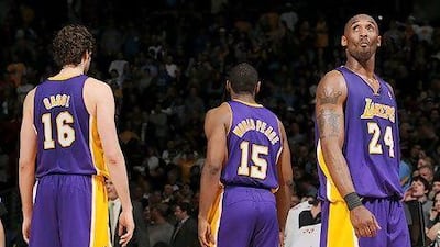 Kobe Bryant, No 24, Pau Gasol, No 16, and Metta World Peace will be joined by Steve Nash and Dwight Howard this season. Garrett W Ellwood / Getty Images