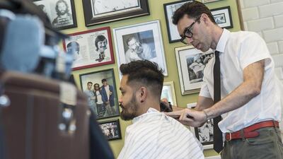 Julian Colclough at the Julian Hairdressing for Men shop he opened at Arenco Tower in Media City . Antonie Robertson / The National