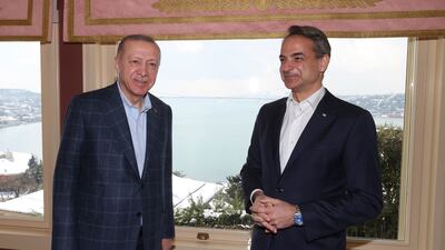 Greek Prime Minister Kyriakos Mitsotakis and Turkish President Recep Tayyip Erdogan held a rare meeting on Sunday. AP