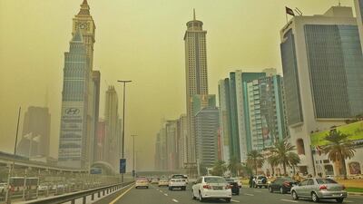 Sheikh Zayed Road glows golden in Dubai. Photo by Jad Rajab