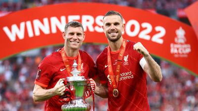 Liverpool's James Milner, left, and Jordan Henderson celebrate after winning the FA Cup final against Chelsea. Reuters