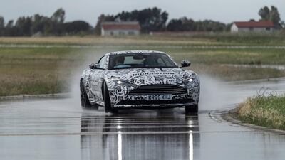 A camouflaged pre-production example of the new Aston Martin DB11 being put through its paces during testing at Bridgestone’s proving ground near Rome. Courtesy Aston Martin Lagonda