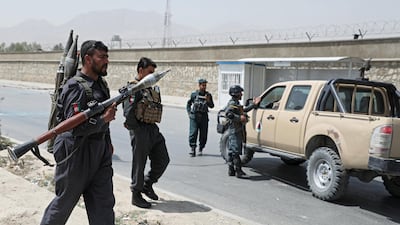 Afghan police officers keep watch at the site of a car bomb blast in Kabul, Afghanistan, August 7, 2019. REUTERS/Omar Sobhani