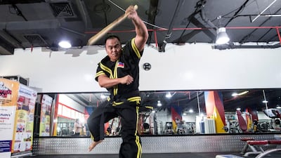 Guro demonstrates a weapon attack. Ruel Pableo for The National for Nick's story