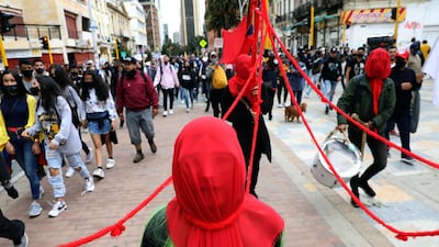 People protest during an anti-government demonstration near the Plaza de Bolivar in Bogota, Colombia. EPA
