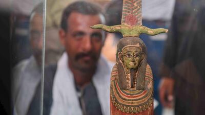 A statue on display during the unveiling of an ancient treasure trove of more than a 100 intact sarcophagi. AFP