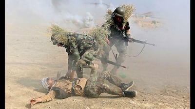 Afghan National Army officers take part in a training exercise at the Military Training Centre in Kabul, Afghanistan. Omar Sobhani / Reuters