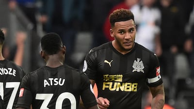 Newcastle United’s Jamaal Lascelles celebrates victory over Swansea City. Rebecca Naden / Reuters