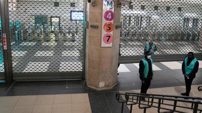 The subway entrance is closed under the Gare de l'Est train station in Paris. AP