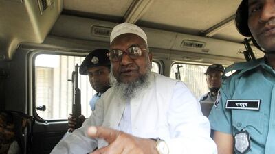 Bangladesh's Jamaat-e-Islami leader Abdul Quader Molla in a police van in February this year. Reuters