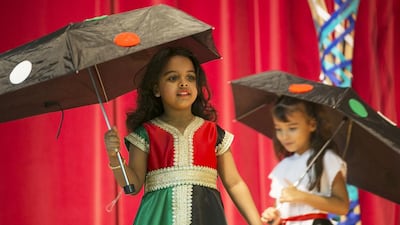 Pupils of the German International School in Abu Dhabi celebrated National Day early by putting on a performance planned by Emirati artist Azza Al Qubaisi. German ambassador to the UAE, Dr Eckhard Lubkemeier, was also present. Mona Al Marzooqi / The National