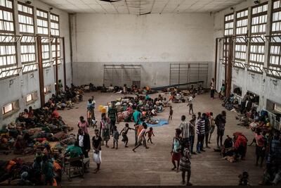 People shelter in the Samora M Machel secondary school in Beira, Mozambique, following the devastation caused by Cyclone Idai. AFP