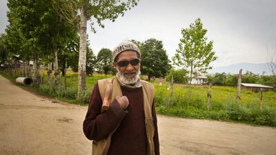 Patient Mia Khatana walks around the compound.