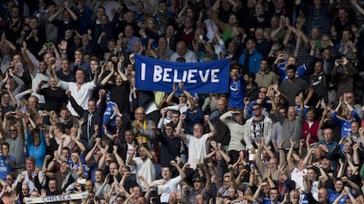 Jubilant Chelsea fans celebrate as their team defeat Liverpool 2-0 in their English Premier League soccer match against Liverpool at Anfield Stadium, Liverpool, England, Sunday April 27, 2014. AP Photo/Jon Super