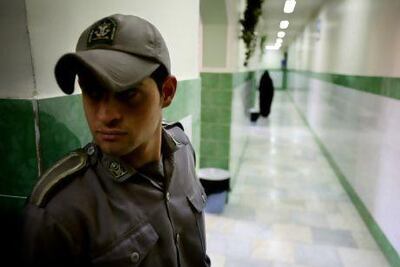 A guard stands on a corridor in Tehran's Evin prison. Reuters