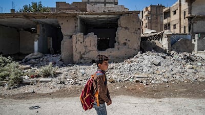 A number of buildings were damaged in Syria as a result of the decade-long conflict. AFP