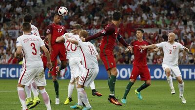 Portugal winger Nani tries a headed attempt at goal. Yves Herman / Reuters
