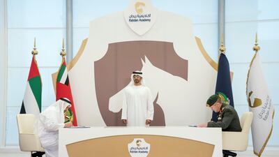 Sheikh Mohammed bin Zayed witnesses a MOU between Ministry of Defense and Rabdan Academy. Rashed Al Mansoori / Crown Prince Court - Abu Dhabi )---