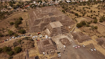 Mexican authorities gather at the Teotihuacan pyramids, where a man shot and killed a Canadian woman. Reuters