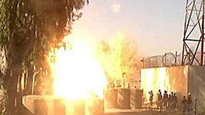 Smoke billows from a suicide attack in Khost province, which killed 20 Afghans including 14 children.