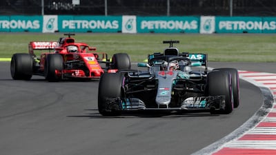 Lewis Hamilton drives his Mercedes-GP car and Sebastian Vettel his Ferrari in Mexico. Hamilton is drivers' champion for 2018 but the constructors' championship can still be won by either of the two manufacturers. Reuters