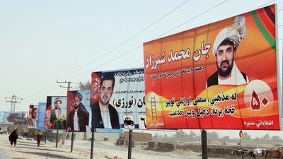 Election campaign posters are installed on a road side ahead of the upcoming Parliamentary elections, in Helmand, Afghanistan. The Taliban appealed to the people of Afghanistan to boycott the upcoming parliamentary elections in the country. EPA
