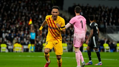 Pierre-Emerick Aubameyang celebrates after scoring Barcelona's fourth goal against Real Madrid. AP