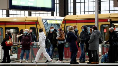 Passengers wear face masks as they wait for a commuter train in Berlin. Germany was successful at suppressing the virus early in the pandemic. Reuters