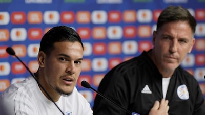 Paraguay's Gustavo Gomez and coach Eduardo Berizzo during press conference. Reuters