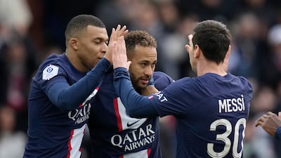 Neymar celebrates with teammates Kylian Mbappe and Lionel Messi after scoring PSG's second goal. AP