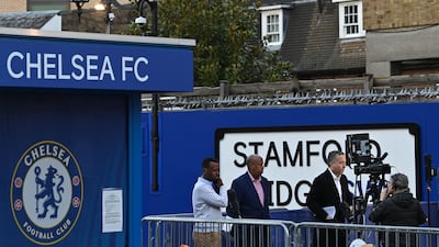 Members of the media work outside Stamford Bridge. AFP